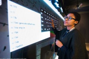 Leyard Multi Zone LED Touch Wall woman touching screen