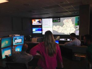 MTEMC Screen with woman standing in front