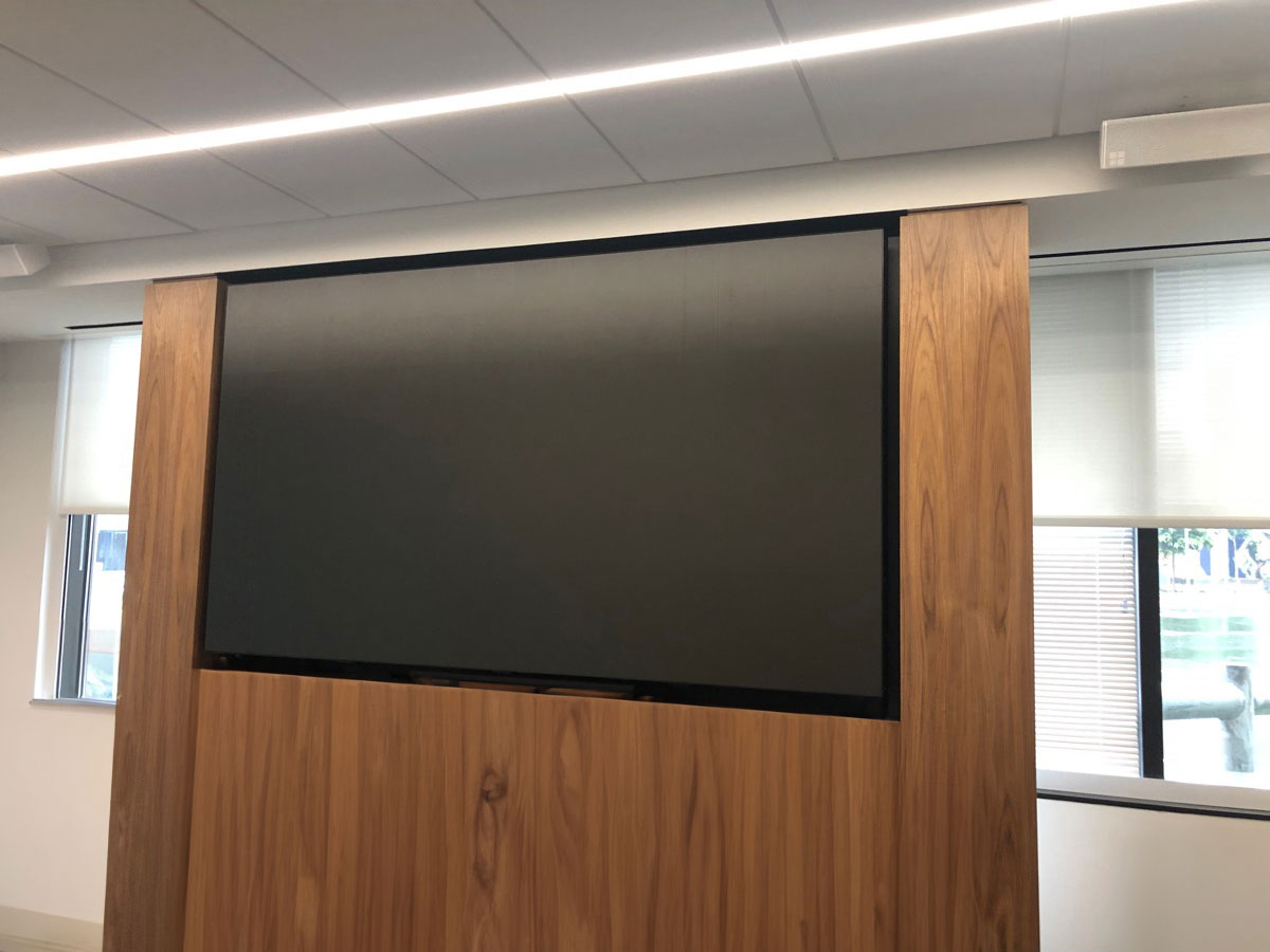 Finished product of a 4x4 floor-to-ceiling mounting structure with a blank screen
